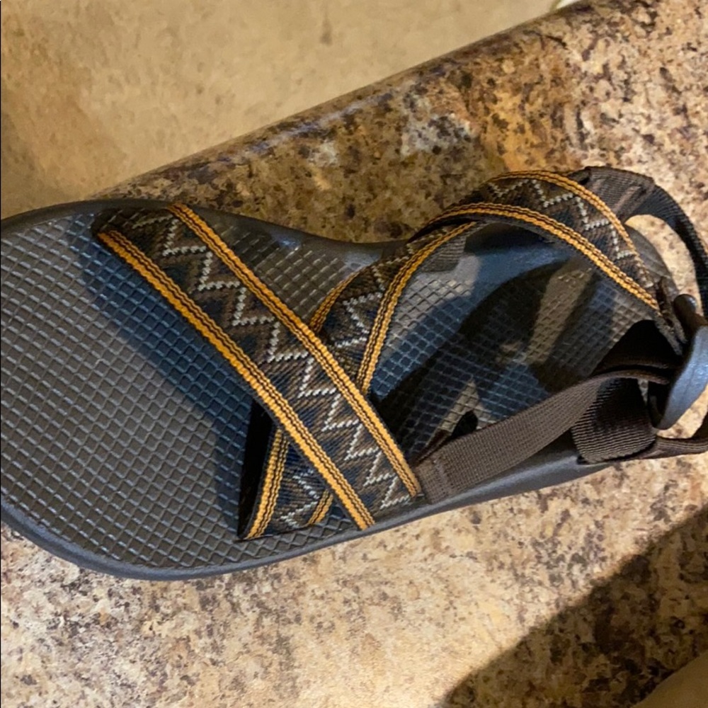 A pair of Chaco men’s size 9 Sandals. Never worn